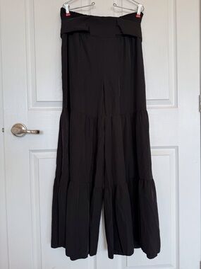 Bloomer style wide leg tiered black pants elastic waist self tie.